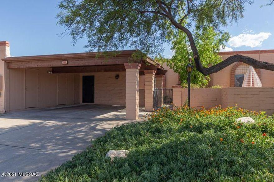 Charming 3 bed, 2 bath townhouse located in the heart of Tucson in the quiet McCormick Place community, offering a sparkling pool and spa. This home features spacious bedrooms, an inviting living area with a cozy fireplace, and a kitchen with abundant cabinet space. Enjoy the adorable front courtyard and private paved backyard, perfect for relaxing or entertaining. Additional highlights include an in-unit washer and dryer, two-car carport, extra-large storage room, and a private covered patio. Ideally situated near TMC, popular restaurants, shopping, and the Rillito River bike path, this home combines convenience, comfort, and charm in a desirable central location.