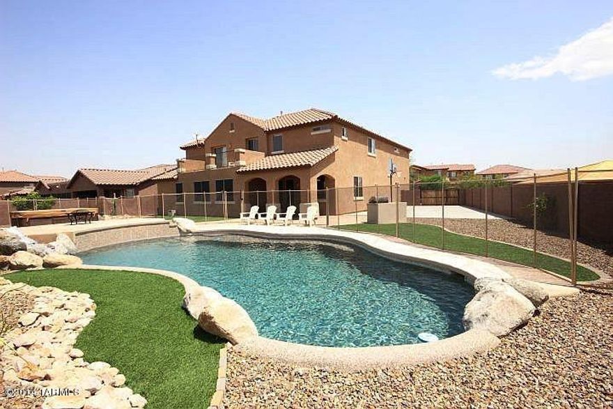 This is a long term lease to purchase agreement. Gorgeous 6bd/3bth home with the Perfect yard for entertaining! Huge Pool with raised platform area and detached Spa. Lots of upgrades in spacious home! Separate formal living room off of entry, and great room layout with luxurious kitchen and family room. Separate entertainment room off of the family room. Half basketball court, large covered patio with balcony off of master suite!  This house is located in desirable Tangerine Crossings, a gated community with two community parks!