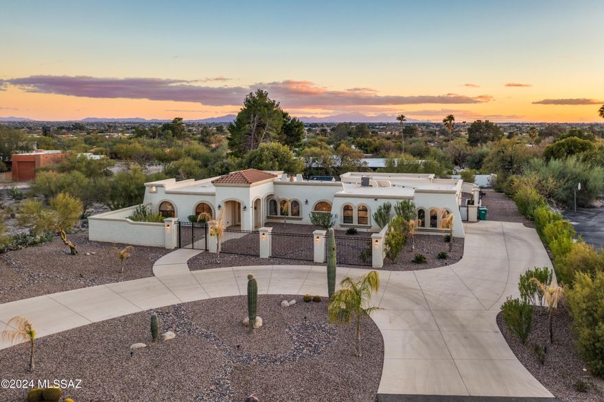 Exquisite 4 bedroom, 4 bathroom home situated on a private cul-de-sac in Sabino VIsta Heights, a highly sought after peaceful neighborhood. Luxioursly upgraded throughout, it offers an ideal layout w/ two spacious primary suites w/ separate patios  & separate living areas, gourmet kitchen  w/ new stainless steel appliances, a double oven, large island, breakfast bar & stunning granite counter tops. New luxury flooring installed throughout home, custom lighting & a brand new electrical sub-panel. Enjoy breathtaking mountain & sunset views from this beautiful property. A grand entrance welcomes you w/ a circular driveway, meticulously landscaped front yard & welcoming foyer. Fantastic location w/ top-rated Fruchthendler Elementary school, close to Sabino Canyon and many hiking trails