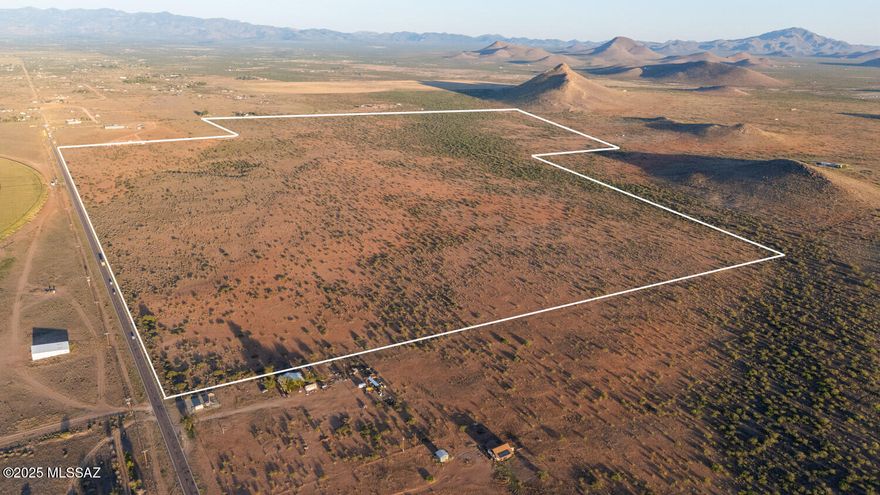 This nearly 400-acre parcel offers breathtaking mountain views, rolling grasslands, and endless possibilities! Located in one of the most beautiful areas of the valley, it's perfect for a horse property, homestead, ranch, or investment. Enjoy dark night skies, abundant wildlife, and nearly a mile of paved frontage. The property features two wells, including one an impressive 960 feet deep, plus power at the property lines. Partially fenced and ready for livestock, it can be purchased as a whole or in smaller parcels—seller is willing to split and finance! Whether you're looking to build, invest, or expand your agricultural dreams, this is an opportunity you don't want to miss. Call today to explore the possibilities!