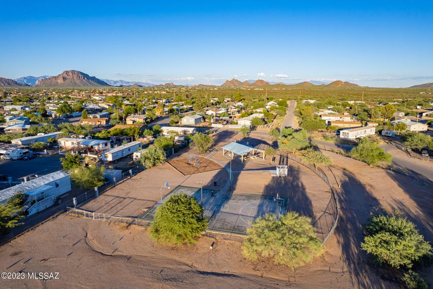 This .18 acre, Bare Land Lot is spacious and serene with potential to become your ideal home site, manufactured or investment property. Enjoy living in a densely populated area while having easy access to nearby city conveniences, schools, shopping centers and many recreational activities. Fully fenced yard with 2 large front access gates. Shade trees. Park, BB Court, Swings, Covered Picnic area are all neighborhood amenities just a short walk away. Access to city utilities; water, electricity and sewer for quick and easy hookup. No HOA. Clean lot, move-in ready.
