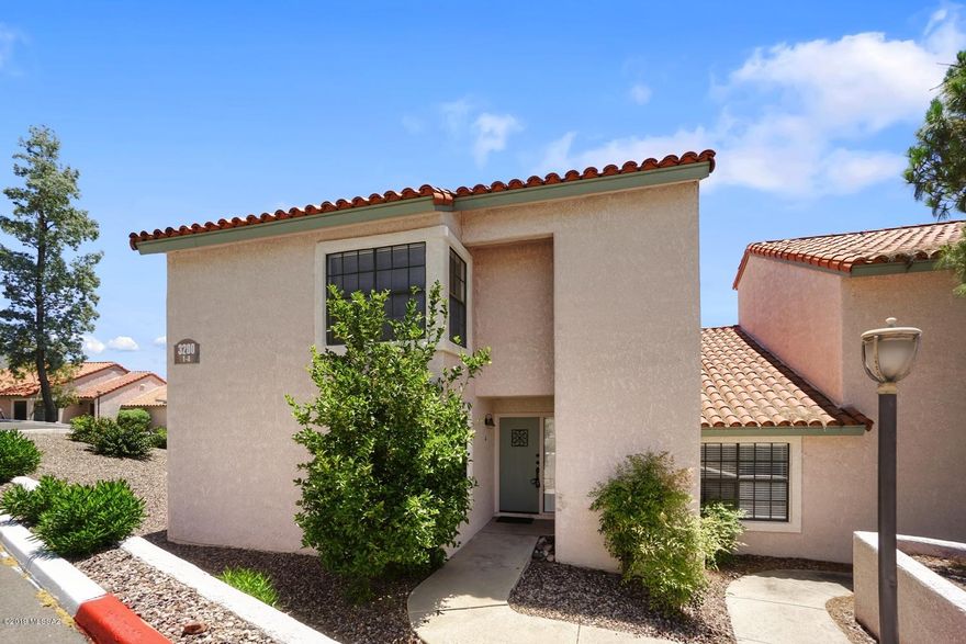 Catalina Foothills Resort style condo- 2 bdrm/ 2 bath-Two-Story. Efficient kitchen w/ SS appliances, living & dining room, and one bdrm and bath downstairs. Master bdrm and bath located upstairs. Carpet/tile flooring, washer/dryer, ceiling fans, single carport, covered patio, community pool/spa, tennis and clubhouse. Very convenient to shopping and Encantada Mall. HOA water will be rebilled to tenant. All Electric Home - Decor Only fireplace. (Campbell/Skyline)