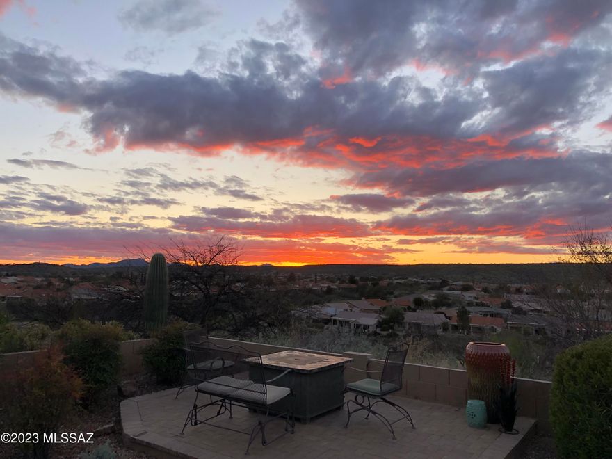 Wonderfully private, no homes across street, sits above golf course w/open desert in distance, mountains to south and spectacular sunsets! This expanded LAREDO has 2' wide extension on den/guest room side of home; garage also 2' wider. Single owner snowbirds' seasonal home - no rentals, no pets, no summer occupancy. Primary bedroom w/bay window. Covered back patio w/paver extension has natural gas grill, viewing patio w/portable fire pit (as-is), and sunshade. Front paver patio welcomes you to this private home on quiet cul-de-sac. Utility sink and water softener in garage. Kitchen has gas range and granite. Den has French doors for privacy w/pull-out sofa for overflow bedroom. TURNKEY option - furnishings & household items on separate bill of sale (exclude a few personal items).