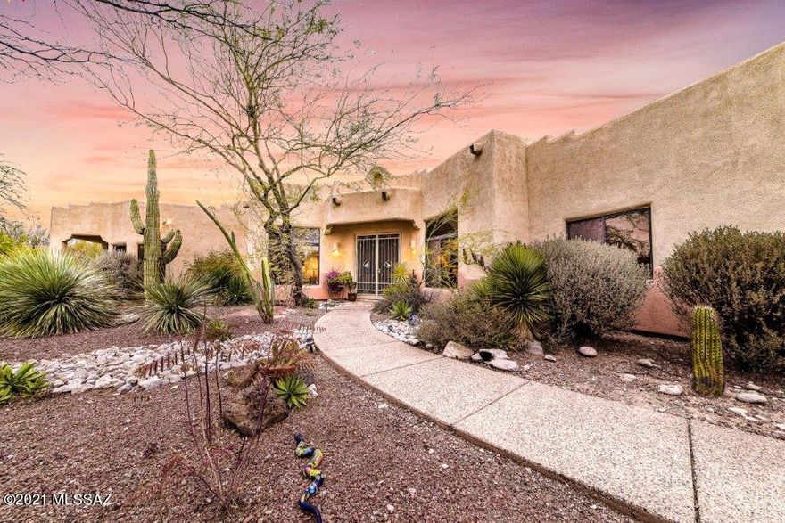 This Foothills home is located in a serene, gated community offering 4 bedrooms, 3 bathrooms, a pebble-tec pool PLUS breathtaking Catalina Mtn views! This home has everything you've been looking for! The gourmet kitchen features double ovens, granite countertops and a large island. Off the kitchen is a breakfast nook with large windows showcasing the beautiful Catalinas. A perfect place for your morning coffee! Relax in the spacious living room in front of the gas fireplace or enjoy dinner parties in the formal dining area. This home was built for entertaining! The master suite has its own private patio, walk-in shower and jetted tub. Take a dip in the pebble-tec pool during hot summer days in your private backyard oasis.  Come make this gorgeous house, your new home! Other features of the home include: Multi-Room audio sound system,  murphy bed in guest bedroom/office, tray ceiling in living room, built-in closet system in master bedroom, electric awning on back patio plus so much more!
