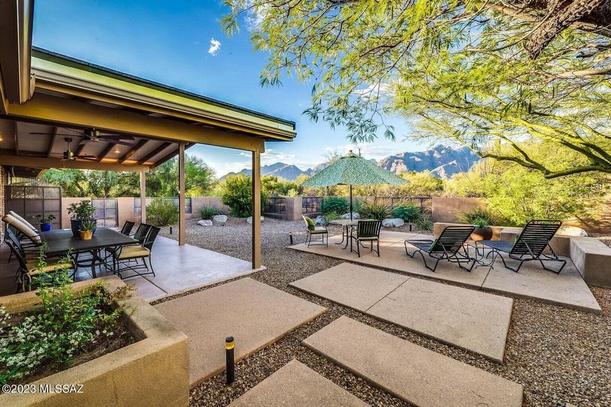 Priced Below recent appraisal at $870.000. Panoramic Mountain Views from this Rare Find in Catalina Foothills Estate #5 Double-Brick Home with 3 bed/3 bath.Gorgeous remodel with over $250k in Modern Custom High-End Finishes including Solid Custom Maple Cabinetry, Solid White Oak & Italian Porcelain Flooring, Caesarstone Quartz Countertops, Professional Viking/Bosch SS Appliances. All Kohler Bathroom Sinks, Tubs, Toilets, & Fixtures. Designer Lighting includes Flos Dining Lights & Kichler Ceiling Fans. This Exceptional Property is Truly Remarkable in one of the most Desirable Locations in the City, the Catalina Foothills. This area boasts Upscale Shopping,Fine Dining, Art Galleries, Major Resorts, Country Clubs, Top-Rated Schools, World-Class Golf, Tennis, & Hiking Trails Home features Gorgeous Gas Heatilator Fireplace and Custom Built-ins in Great Room. Both Primary Oversized Bedrooms have Ensuite Bathrooms, 3rd Bathroom has Shower, Exhaust Fan and Oversized Tub. Hunter Douglas Blackout Shades, Bosch Washer/Dryer and Velux Skylight, Security Shutters, Iron Security Doors, Low Care Landscaping on Drip System. Large North Facing Covered Patio is perfect for Enjoying Year-Round and Extends your Living Space by another 1000 sq ft. Oversized Garage with Epoxy-Painted Floor and Solar Fan. The Garage could easily be Converted into an Extra Room which gives you approximately 780 sq ft, and there is still plenty of property to add a garage.  Newer Concrete Tile Roof with Wool Insulation, newer HVAC with Sanuvox UVC Air Purifier, Newer Water Heater & Newer Septic Tank. The Outside Storage area has Electricity and Water. Plenty of room to add a pool or additional sq ft. Only 2nd Owner since 1980. This home is Move-in Ready and hard to find in the Foothills. This is Truly a Gem!!!