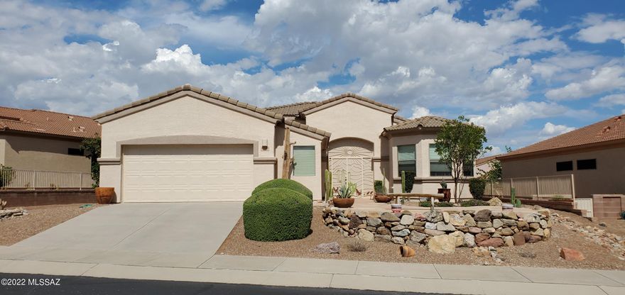 Welcome to this 2 bedroom, 2 bathroom home in the beautiful Canoa Northwest neighborhood.  There is an office/den and an extra bonus area in the laundry room.  North facing covered patio is a great place to enjoy the partial mountain view.  This is a great price for a home in this area.  Home is being sold ''as is''.