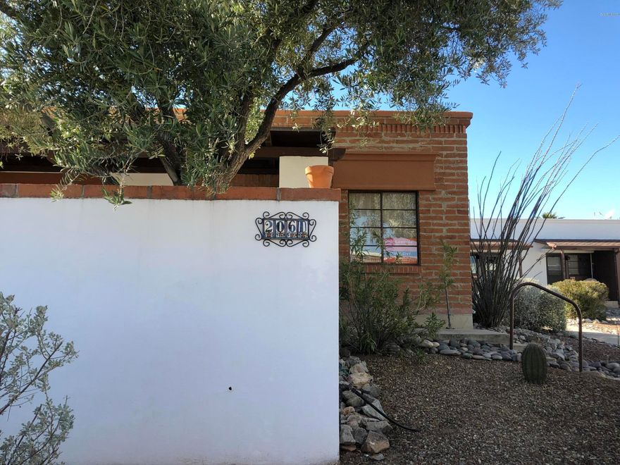 AGE RESTRICTED COMMUNITY!  Clean and updated corner unit villa with wonderful views of the Santa Ritas from your shady front porch.  100% tile flooring, new refrigerator, water filtration,  and microwave. Easy living, community pool, spa , gorgeous mature landscaping and laundry facilities.  GVR access available on this unit too should you choose.  Perspective tenant must provide proof of income references, and credit rating. Small dogs considered with pet deposit.  Call or Text Tina Hurley 520-398-2751 for more information.