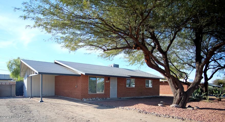 Premium finishes throughout this remodeled East Side 3 Bedroom/2 Bathroom home include granite countertops, contemporary cabinetry, new appliances with gas range plus washer & dryer included, ceramic tile flooring throughout, central air conditioning, and new windows. The oversized yard has mature trees and desert plants in the front yard and backyard is fully walled-in for privacy plus includes a storage shed. Ample off-street parking is provided by a carport space and additional parking that's double wide. Tenant pays all utilities. 1yr minimum Lease, $50/adult Application Fee, $1500 Security Deposit, $150/pet Pet Fee with approved pet, $400 cleaning fee.