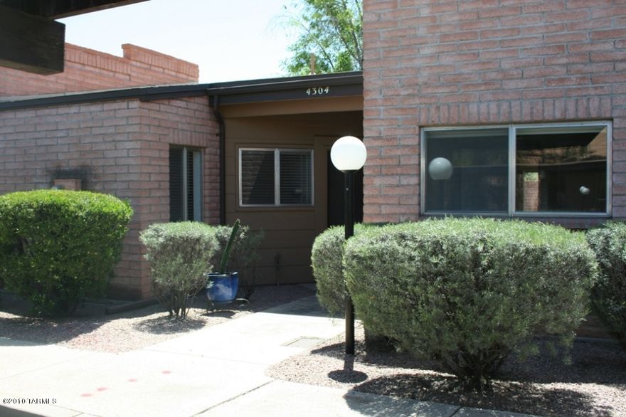 Built 1980, Updated 2 bedroom, 2 bath Townhome features wooden flooring in main living areas, carpeted bedrooms, living room with fireplace, Eat-in kitchen with stainless steel appliances refrigerator, laundry room with washer & dryer, walled rear yard with covered patio, covered parking, Community pool, next to YMCA and city park. Security deposit $1190.00. Pets are subject to approval.***RENTAL RATES REFLECT A $65 CONCESSION FOR TENANT'S AGREEMENT TO CHANGE HVAC FILTERS MONTHLY. RENTAL RATES ARE $65/MO HIGHER THAN STATED W/O CONCESSION***