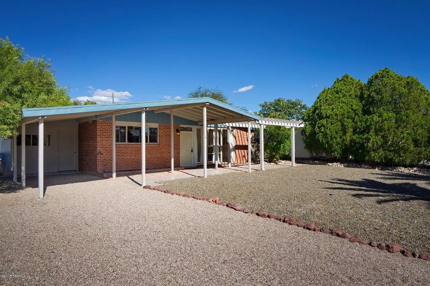 Mid century modern architecture in desirable neighborhood freshly remodeled open concept home. Mid century modern architecture has floor to ceiling windows that brings in the natural light. Kitchen has alder wood cabinets with full plywood construction & crown molding. All new stainless steel appliances including whirlpool refrigerator, dishwasher, oven/stove, undermount sink and built in microwave. Kitchen continues with granite countertops, under cabinet lighting, recessed LED lighting and granite backsplash opens up to dining area with new chandelier. This 4 bedroom, 2 bath has an additional office area with built in bookshelves, alder wood desk & granite top . Baths remodeled with guest bath having beautiful travertine walk-in shower w/seat. Energy efficient 
dual pane windows, click- Large fenced back yard with covered patio, new pebble rocks with citrus & olive trees. 7 fans throughout, new fixtures, fresh paint inside and out & new security front door. Close to shopping centers and both malls.