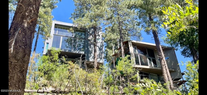 Out of this World Architect Kevin B. Howard's Origami Ultimate 3 Story Modern Glass Tree House with Stunning Mt. Lemmon/Forest Views.  Top-of-the-Line materials, appliances, fixtures, finishes and quality. Those who know the genius of Kevin's many Multi Million Dollar Residences in Tucson, Oro Valley and Marana can attest to his Unparalleled Designs and Values. A perfect Summer Retreat. Call for a private viewing or a personal meeting with Kevin Howard.