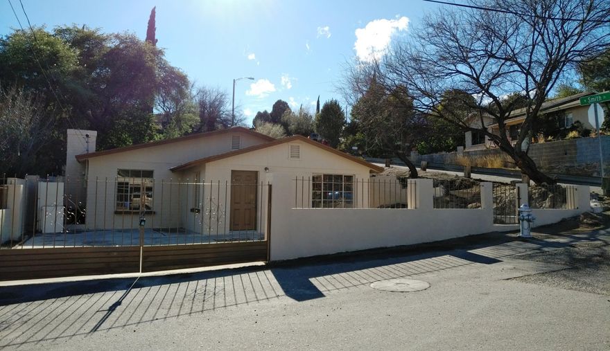 Fully transformed and remodeled, this home features a nicely modified open floor plan concept within a decent size great room. New flooring in all living areas, laminate flooring in bedrooms, beautiful new kitchen, custom paint inside & out, and even a new 30-year shingle roof. Move-in ready, take a quick peek before it's gone.  Seller holds an active real estate license in the state of Arizona. Owner-agent.
