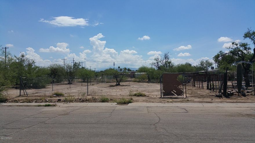 Build a dream home on this prime lot. Located in an area of the City with big dreams for the future, this R-1 lot is ideal for owners who would love to be a part of this exciting expansion and growth. Less then 1 mile from Electric Street car provides access to Tucson night life, fine dining and University of Arizona. Views of ''A'' mountain for the Fourth of July Spectacular will have family gathering at your home for celebration of America's Independence!