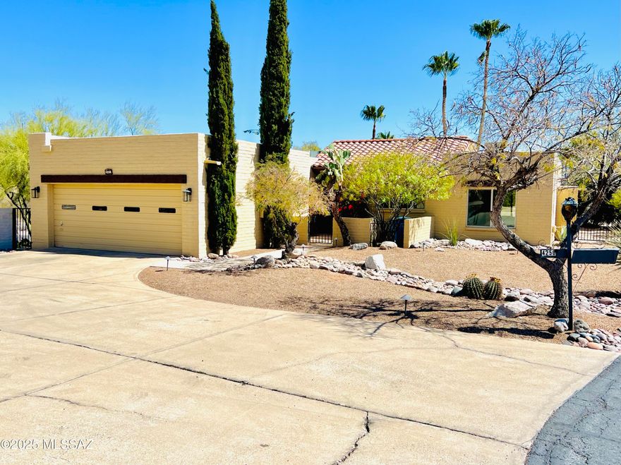 Experience luxury living in this completely renovated adobe home located in the prestigious gated community of Pontatoc Estates.Set on an elevated oversized lot,this property features a stunning pool with a pebbletec finish,concrete benches and water feature, perfect for entertaining with sweeping views of the Catalinas raised deck by the pool.The home boasts a brand-new Chef's kitchen, 2 new AC units ,paint,pebbletec pool,floors,doors,cabinets,light fixtures,new baths.No detail was overlooked. Turnkey-spotless laundry room, new interior doors, and an office created from previously u
