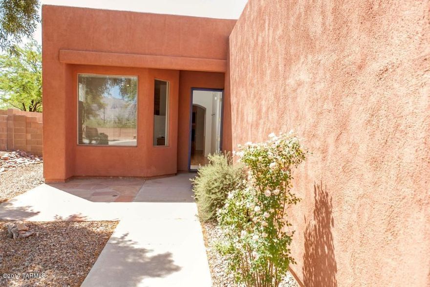 Location-Location-Location! Tucked away off busy streets this lovely 3bd/2ba is loaded with charm from the minute you walk in the door! Gated community with only 28 homes & on a quiet cul-de-sac & private bkyrd with nice plantings and a full-length cov'd patio that's perfect for relaxing & entertaining! Beautiful wood flooring, open kitchen/living room & charming eat-in brkfst nook w/bay windows & gorgeous views of the Catalina Mtns! Separate laundry-room, ceiling fans thru-out, great closet space & large mstr bdrm! Fireplace in living room, built-in wall niches & vaulted ceilings lend to the spaciousness of this well-maintained home! 1 small dog allowed (20lbs or less) with additional Pet Deposit and $10 per month pet rent. No Cats. Call today for app't to view!