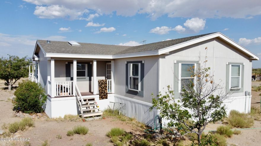 VA Assumable Loan Balance owing September 1st 2025 $195,342.51. 
$212.63 goes toward the principal so as of September the amount owing will be $195,129.88. Rate is 5.75% Total monthly payment is $1427.15.
Beautiful and well-maintained 3-bedroom, 2.5-bath triple-wide manufactured home situated on 2.5 acres in the peaceful countryside of Willcox, Arizona. This spacious home features an open-concept layout with a large living and dining area, perfect for family gatherings or entertaining guests. The generously sized kitchen includes abundant cabinetry, ample counter space, and a propane gas stove--ideal for cooking enthusiasts. All appliances are included, making this home truly move-in ready. The primary suite offers a private bath with a soaking tub and separate shower, while two additional bedrooms share a full bath. A guest-friendly half-bath adds extra convenience. You'll also appreciate the large laundry room with extra storage and workspace.Enjoy Arizona's stunning scenery from the expansive deck, perfect for outdoor dining, relaxing, or taking in the mountain views. The property also includes a barn and a small horse facilityideal for equestrian use, livestock, or hobby farming. A private well provides reliable water, and the 2.5-acre lot offers plenty of space to roam.
Additional highlights include a recent engineering certification qualifying the home for FHA and VA financing, as well as an elevation certificate from the seller that helps lower flood insurance costs.
This property offers the perfect blend of rural charm, functionality, and comfortready for you to call home.