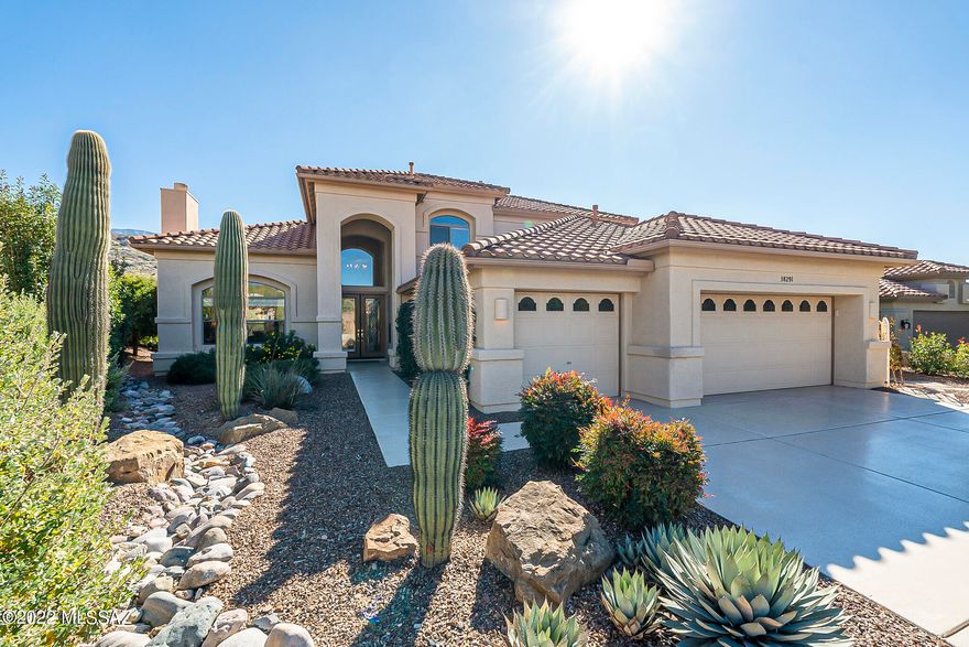 Breathtaking, totally unobstructed mountain views from this stunning Sundance model! Enjoy abundant wild life, glorious sun rises & serene privacy from the home's many walls of windows + fully covered patio & backyard. Kitchen boasts 5 burner gas stove, cherry cabs w/pull outs & farmer's sink. Large master suite w/His & Hers closets, slider to patio, neutral carpet & huge block shower. Downstairs den/office w/French doors & wood blinds. Two large bedrooms, Jack & Jill bathroom + two closets up the striking, spiral staircase to the second floor. All new sunshade window treatments in relaxing family room. Powder room w/pedestal sink. Exterior repainted in 2018, new irrigation system in 2019, alarm system, Kinitco water system, epoxy coated driveway, front walkway & 3 car garage.
