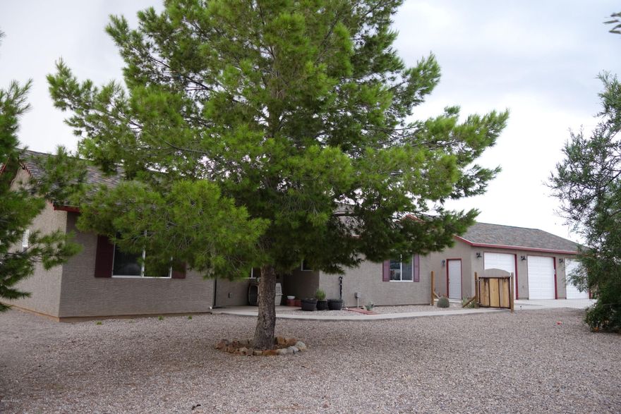 Wonderful custom built by owner contractor with over 20 yrs experience.  Very energy efficient. Large formal dining room.  New extension craft room could be 4th BR. All appliances stay.  Has water softener. New Patio this past week-end.  Over sized unattached 3 car garage with 1040 SF. Large fenced yard with Chicken coop with 7 chickens. They stay (Eggs anyone).  Owner has garden area.  Fruit trees.  Great home no HOA.
