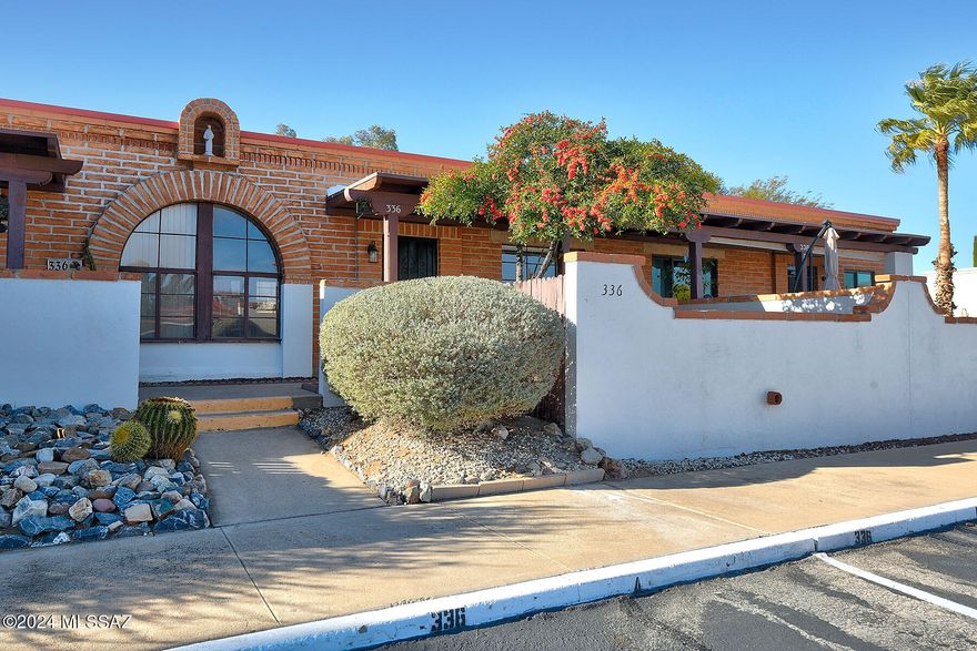 Beautifully remodeled Villa to include new cabinets, stainless steel appliances, dishwasher, gas range, built in microwave, refrigerator w/ice maker, tile throughout, walk in shower, fresh paint, new lighting & ceiling fans, new plumbing trims, doors, electric panel has been replaced and much more!!!  Laundry room off kitchen with standard washer and dryer as an added bonus for your convenience .  Unit being sold furnished as shown with the exception of the art in living room & staging accessories. Don't miss this gem & Welcome Home!!!
