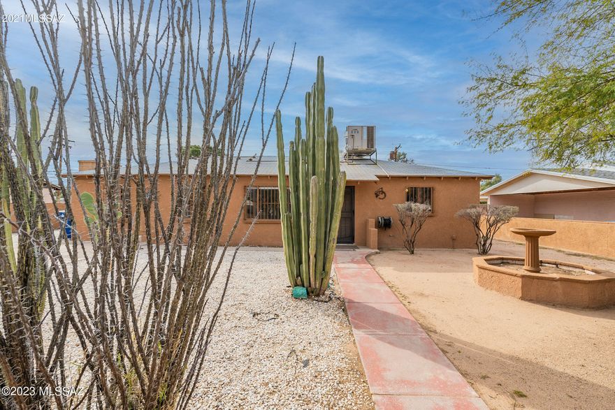 Welcome Home!!  NO HOA!!  Come see this wonderful home with lots of parking on a large lot. We have a block wall surround, with a  workshop in the garage which has 220.  If that's not enough, we have covered RV parking with partial Hookup, Tuff Shed for storage, gas fireplace, 2 living areas, and great kitchen prep area. This great home has newly painted exterior,  newer water heater and gas lines, low care front and back yards, great for large gatherings.