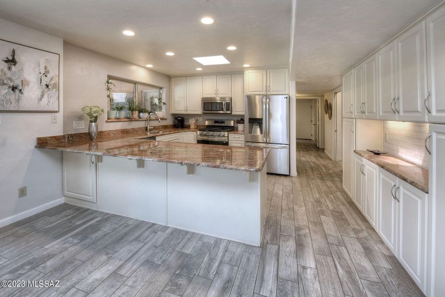 Stunning remodeled home in desirable Forty Niners Country Club Estates. This lovely home has a Bright open floor plan. Modern Kitchen opens to eating area w/Fireplace & French doors leading to Resort like Backyard. Spacious Living room opens to Dining Area w/French doors leading to separate Patio area. Primary Bedroom suite offers large walk-in closet, French doors to backyard, Gorgeous bath w/dual vanities, walk-in shower & large soaking tub. 2 car garage w/workshop area & separate storage. Resort like Backyard is private w/Pool, covered Pond & Waterfall, separate Firepit area, outdoor Bar & covered Patio area for Dining & Relaxing. This fabulous Forty Niner's community offers, Golf, Community pool, Restaurant & Various Events throughout the year. What a fabulous place to call home!