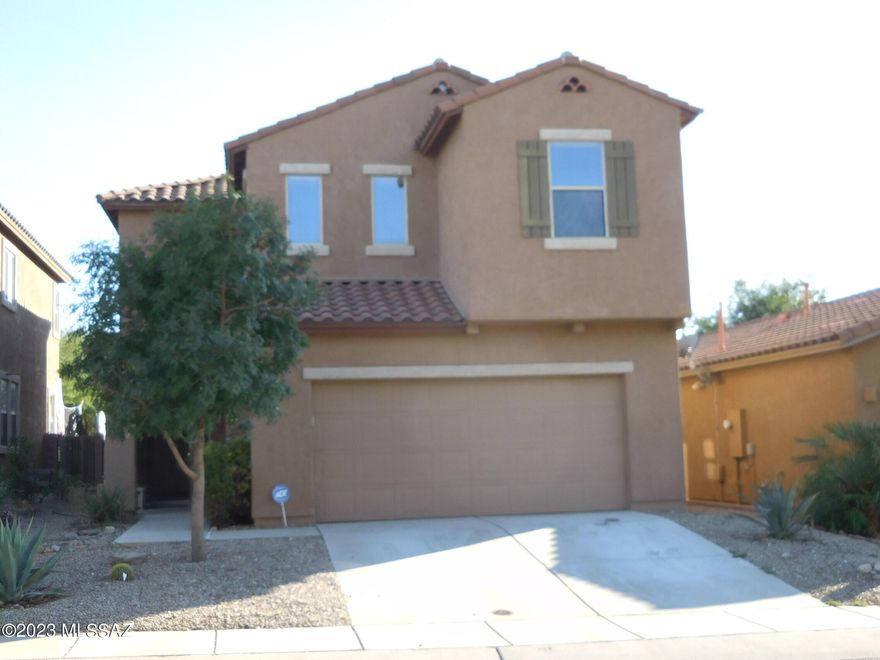 Move in ready 5 Bedroom 3.5 Bath Home! 
Property offers 2350 sqft  of living space with Large Living room and Family room off of kitchen with a separate Formal Dining room. Large Master Bedroom, Master closet and Master Bath.  Three nice sized bedrooms with last separate Bedroom having its own private bathroom.  Kitchen offers plenty of cabinets, microwave, stove and refrigerator and outside views from kitchen sink. Rear yard backs to open space for privacy and sunset view. Garage includes built in workbench. Call for showing!