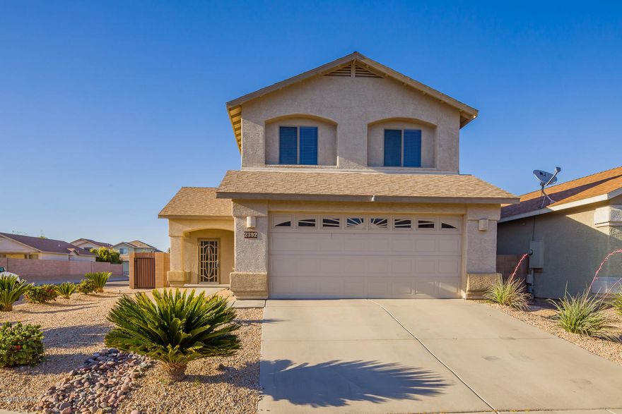 Move in ready house in a super convenient location! Ceramic tile everywhere down stairs, upgraded carpet upstairs, stainless steel appliances, refrigerator, washer & dryer stay, large artificial turf area in the back yard, tons of shade, balcony off the master bedroom, mountain views & so much more. Make this home yours today!