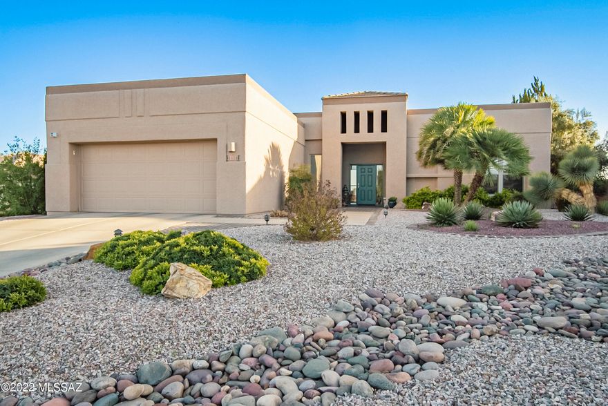 An impressive home with beautiful landscaping and a grand entryway!  Step inside to find an elegant design with an open living and dining room offering beautiful views of desert vistas beaming through the wall of glass.  The efficient shaped kitchen has stainless appliances, quartz countertops and is open to a casual dining area and a family room with large picturesque windows.  The recessed ceiling in the owner's suite offers spatial dimension while the luxurious bath delivers a lengthy dual sink vanity, custom tile shower and a soothing corner soaking tub.  This home has been meticulously cared for by the original owner including window replacements and an HVAC system installed last year.  Sitting high above the San Ignacio Golf course, you will appreciate the delightful paver patio where you can enjoy views for miles and miles of natural desert and several different mountain ranges.  And let's not forget the gorgeous sunsets you will see in the evenings!
