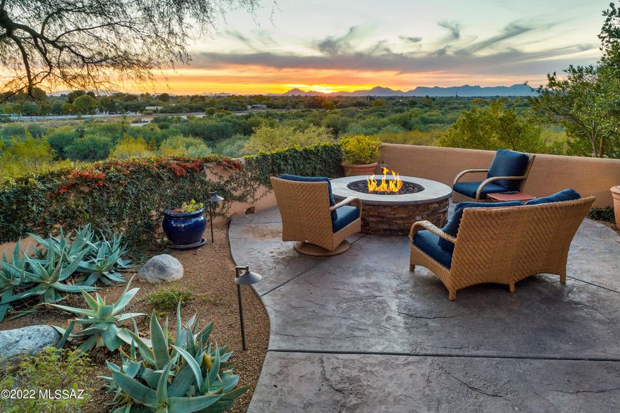 Private, sanctuary-style luxury residence w/ unobstructed, panoramic views of sunsets, city lights, natural desert & the Tucson Country Club golf course . Convenient foothills location  near Whole Foods & the Riverwalk. This one-of-a-kind lock & leave townhome is completely renovated w/ the highest quality materials & craftsmanship creating the ultimate Tucson getaway. Walled & gated courtyard provides privacy & a charming introduction. The impeccable interior space features hardwood & stone floors, a wood-beamed ceiling, & custom solid-core doors. Impressive gourmet kitchen w/ a center island, top-of-the-line SS Thermador appliances including 2 dishwashers, a six-burner range w/ double ovens, &  hood-vent. Exquisite kitchen w/ custom cabinetry & leather granite counters & backsplash. Spacious great room w/ gas bee-hive fireplace & formal dining area. Bonus family room off of the great room w/ built-in TV, room for office space & walls of windows leads to an unrivaled, south-facing backyard w/ a magical mesquite tree w/ a high-canopy, lush landscaping, built-in gas fire pit, & a gate for direct access to the Rillito wash. This enchanting space provides views across the wash to Tucson Country Club Golf Course & the natural desert in between.  Full-size storage room located in the backyard. 3 bedrooms & 2 full baths including a magnificent primary suite w/ french doors to the back patio, a dream walk-in closet w/ custom built-ins found in much more expensive homes. Exquisite primary bath w/ dual sink vanity, separate tub & shower, custom fixtures, cabinets & counters. Oversized laundry room w/ storage & oversized 2-car garage w/ utility sink and built-in storage cabinets. Community pool.

Incredible location just minutes to Basis Charter School, Whole Foods, Orange Theory, Public Library, the Gregory School, Castlehill Country Day School and the River Walk Bike Path- a 133 mile bike loop connecting all across Tucson.

World-class golf resorts nearby include Ventana Canyon and La Paloma.  Exclusive golf and tennis clubs nearby include Skyline Country Club and Tucson Country Club.   

Located at the south-end of the foothills, this location is not far from the University of Arizona and downtown Tucson.