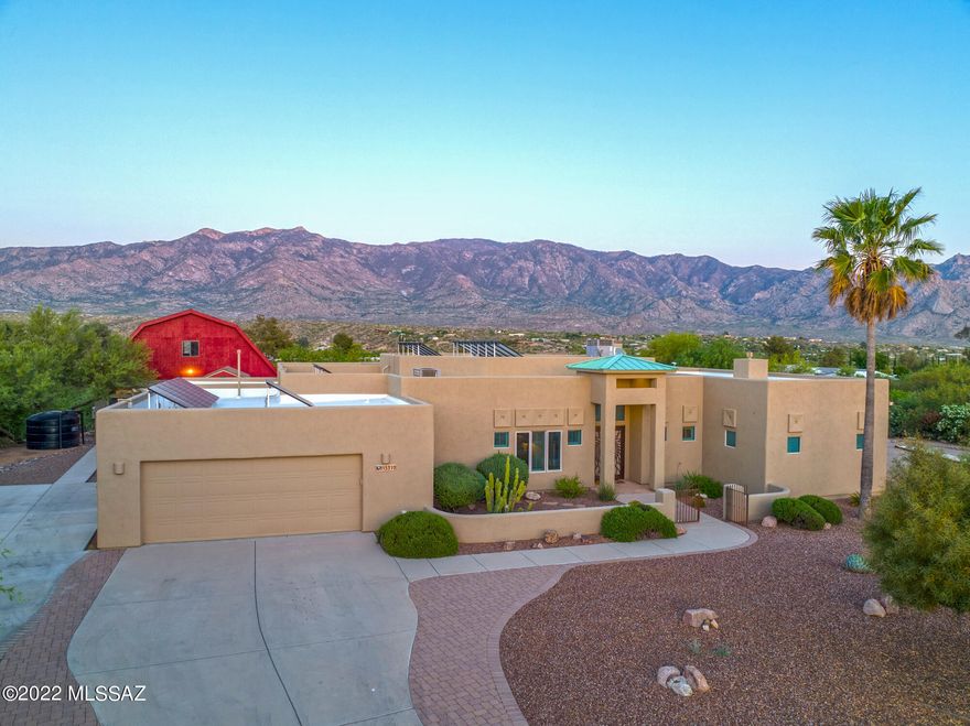 This spectacular custom home with outstanding panoramic Catalina Mountain Views and full guest casita is truly a rare find. Loaded with unique designer touches including double primary suites, custom tile accent walls, plantation shutters, new ''wood'' plank tile floors, updated bathrooms & a true gourmet kitchen. This home also features a fantastic outdoor space with a full length covered patio, screened in porch, fireplace and outdoor kitchen to relax and take in the views. Combined with an oversized garage, space for your RV, loads of storage, new Tuff Shed, Sunpower Solar, water harvesting system and a fully irrigated container garden, this property embraces the Tucson lifestyle and is ready for new owners. $825-$850K Range Price