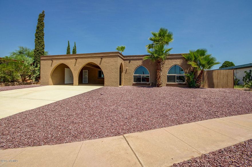 COMPLETLEY REMODELED in golf course Rolling Hills community! 4bedroom/2bath w/pool. All new custom cherry stained cabinets with crown moulding, granite counters, island, SS appliances. New tile, carpet, 2 tone paint, lighting. Baths completely new, shower, cabinets, sinks, tile. Split bedrooms. Unique design with arches and open plan. Large master suite with 3 closets. Fireplace in family room off kitchen. Open and bright. New dual pane windows, custom cathedral front windows. New 5 ton a/c,. Roof recoated. Newly plastered pool, pool deck resurfaced, new fence. Newly coated driveway. New exterior paint and landscaping. Don't miss this beautifully remodeled home, better then new! Towards the end of a quiet street. EVERYTHING HAS BEEN UPGRADED WITH PREMIUM GRADE.
