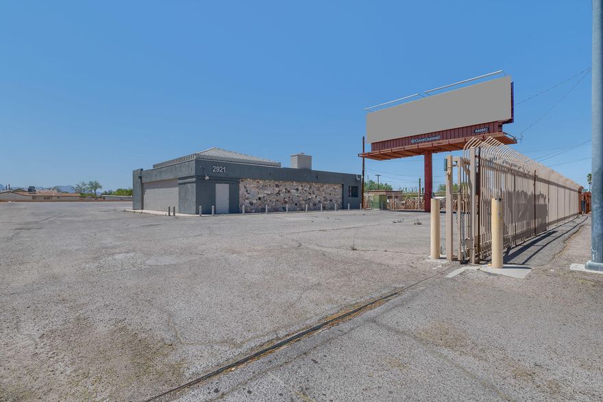 This is a wonderful opportunity for investment. This property offers 4,176 sq,ft building on a commercial acre. Fully fenced with a 8' high wrought iron security fence, large rolling gate. The billboard generates roughly 16,000 a year in income by its self and conveys with the property.  The properties previous uses have been BAR, STONE YARD and USED CAR SALES.
The property is being sold as is.  This is a very high traffic area of town.