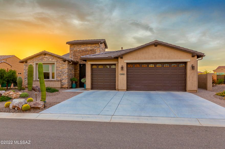Exquisite home in the desired gated neighborhood SaddleBrooke Ranch. Welcome home to luxury living in this exquisite Vienta model loaded with upgrades. This open floor plan features many special touches including upgraded white cabinetry, designer light fixtures, ceiling fans and so much more.  Flooring consists of wood look tile throughout the main areas of the home and upgraded carpet in the bedrooms.  
Cooking is a chef's delight in this elegantly appointed gourmet kitchen that features a generous center island, roll-out drawers, built-in spice cabinet, GE Monogram stainless steel appliances and plenty of storage including a large walk-in pantry. 
Spacious Owners suite offers a luxurious bath with spacious walk-in shower, and a large closet with custom designed organizers. The oversized den with custom built-in cabinetry is ideal for your home office, separate TV room or library. 
Experience the wonder of this glorious backyard oasis featuring a covered built-in barbeque island, rolling shutters, oversized patio, and a soothing water feature, making this an entertainers' paradise.    
This is your opportunity to own a beautiful custom designed home in the Ranch without the wait!
