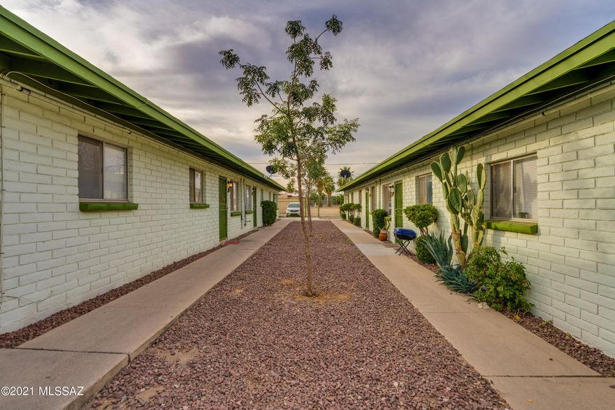 Fully leased turn key apartment! Eight 2 bedroom units in a renovated masonry garden style building with AC, security fencing, lights, and camera system. Laundry room on site. Washer and dryer will convey.
New roof in 2020. Two of the AC units have been replaced.  New landscaping in 2020 including replacing mesquite trees with three Red Push Pastiche trees. Owner pays garbage and water and electrical for common area lighting and laundry facility.
