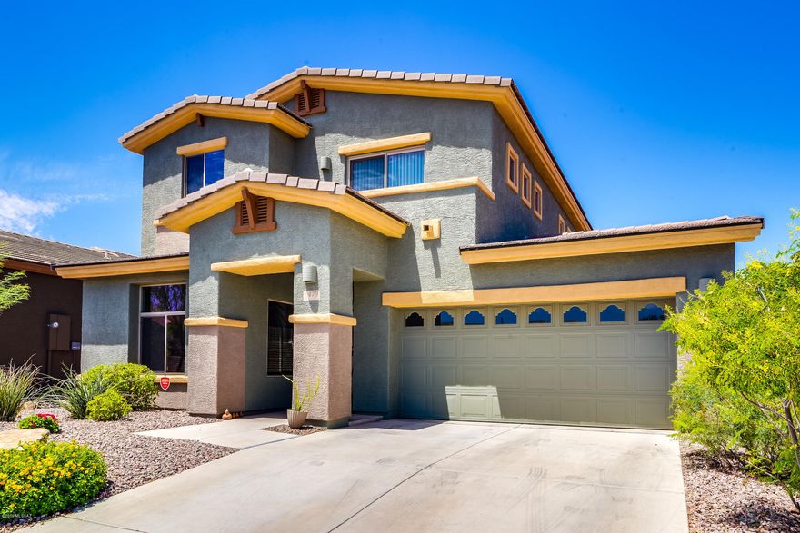 This 2503 sq. ft Meritage built home is truly exceptional in quality and finishes! Located in the desirable Ironwood Reserve community that backs up to reserve desert land with an incredible view of Sombrero peak and an extra side patio. This upgraded 3 bedrm/3 bath plus a den/office has a spacious living room w/ formal dining room that leads into a open family room concept w/ gas fireplace, surround sound, and eat-in kitchen, perfect for entertaining. Luxurious kitchen w/ SS appliances, brand new gas range,  cherry cabinets with roll out tray shelves in lowers, granite backsplash & countertops with a grand island. Incredible master bedroom with bamboo flooring and a walk-out front balcony. The massive master bathroom will win your heart w/ the separate shower & soaking garden tub, separate vanities, storage closet & large custom walk-in closet. Upstairs rooms are connected to a Jack & Jill bathroom w/ dual sinks & separate tub/shower. Generously sized laundry room with utility sink and lots of cherry cabinets. Smart thermostats, fresh exterior paint, brand new 10yr scotch guard carpet, new tile planks throughout front rooms and extra den/office, whole house water filtration system, keyless lock pads, plumbed for a humidifier, 2019 water heater, water softener, and LED lighting throughout. Enjoy the lushly landscaped backyard w/ a covered patio, built-in BBQ, pavers, sitting area, and unbelievable mountain views. Close to schools, shops, restaurants, big stores & minutes to I-10 access!! Spectacular home...Come see today!
