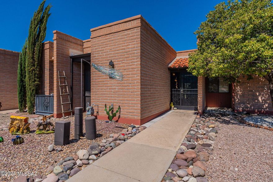 Welcome Home to this enchanting southwestern-inspired casita, where every detail captures the essence of desert living. Nestled against a backdrop of majestic mountains and overlooking the golf course, the setting is nothing short of breathtaking. The heart of the home is a generous living room space, cleverly integrated to enhance the feeling of spaciousness. Here, you'll find comfortable furnishings that complement the rustic charm of the casita, providing a cozy spot to unwind and take in the stunning views from the large windows and where you may spot some of the local wildlife. The bedroom is a tranquil sactuary with the adjacent bathroom continuing the theme with its stylish fixtures and finishes.This turn-key property comes fully furnished, ensuring a hassle-free experience. Whether you're seeking a serene winter getaway or a full-time residence immersed in natural beauty, this southwestern-inspired casita offers the perfect blend of comfort, style, and convenience. Welcome to your "Home Sweet Desert Home!"
