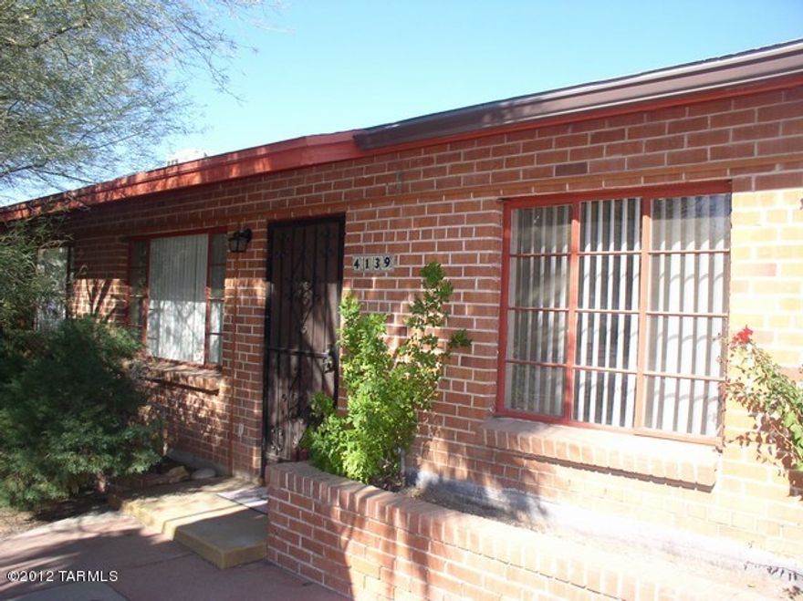Lots of Charm!!! Large living/dining room. Very spacious 2 bedroom, 1 bath, all kitchen appliances private covered patio. View of Community pool from kitchen window . Covered parking & storage, laundry room, water & trash included water $25.00/month.