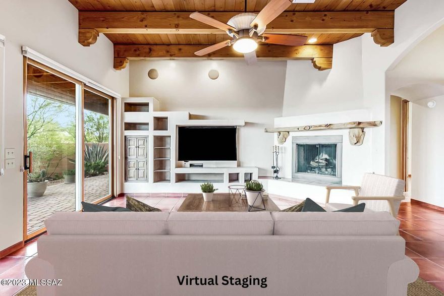 350sf Guest House, 2890sf Main Home, No HOA, No 55+ Age restriction, Room for the RV & Boat, workshop & more. Nestled in a quiet, established neighborhood of custom homes on spacious acreage, this home is surrounded by the beauty of nature. Native giant saguaros, abundant wildlife, and peaceful desert landscapes provide a serene backdrop for your everyday life. Enjoy the convenience of nearby shopping and dining, all accessible by foot, bike, or golf cart. Imagine waking up to panoramic mountain views from your bedroom veranda. Enjoy a relaxing evening in your hot tub, surrounded by nature. Experience the convenience of having a fully appointed casita for guests, and a workshop with plenty of power and ventilation for all of your power tools to thoroughly dive into your favorite hobbies. This energy-efficient, custom-built home in Green Valley, Arizona has everything you need and more. With four bedrooms, three baths, and four and a half acres of private land, there's room for everyone and everything. The new roof, solar panels, and workshop make this home a smart investment for your future.

And with no HOA and no 55+ age restriction, you can bring your RV and enjoy the freedom to live the life you want. Whether you're raising a family, retiring, or simply looking for a place to relax and enjoy the outdoors, this home is perfect for you.
Call today to schedule a viewing!

NO HOA - RV Parking Available
GV Recreation Membership Deeded
Dual-Zone Heating & Cooling
Reverse Osmosis Drinking Water Filter System
Whole House Water Softner
Dual Drip Irrigation System (Currently not in-service)
Solid Alder Woodwork Throughout - Doors, Windows, Deco Trims
High Ceilings - Wood Beams & Corbels
Built-In Display Shelving - Entertainment Center - (Flat Screen TV will Convey)-Great Room
Antique Teak Doors From India on Built-In Stereo/Storage CABINET - Great Room
Custom Metallic Faux Paint Accent Walls - Great Room, Master Suite
Ceramic Tile Floors Throughout, Saltillo styling, matching baseboards
Fireplace - Dual Gas or Wood w/Gas Lighter
FP Mantle - Custom Pinion Pine Live Edge & Korbels
Carved Twist Wood Accent Poles - Formal Dining Room
Built-In STEREO Speaker System - Ceiling of Great Room
Corner Nook, Table, Bench & Chairs, Included - will Convey
Kitchen - JENNAIR Gas Cook Top & Griddle-Down Draft, Electric Double Ovens Built In Microwave / Convection Oven Wood Beams & Alder Wood Cabinets, 48" Uppers, Pull-Out Shelves Huge Walk-In Pantry Hanging Pot Rack Kitchen Island With Storage And Breakfast Bar for Seating, Wine Cooler Refrigerator
Large Laundry Room, Sink, Storage, Cabinets & Countertops for Hobbies/Office
Skylights