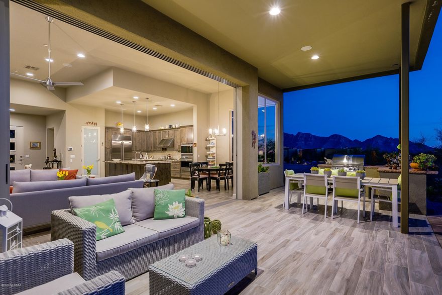 You can have it all! Near-new cnst, dramatic high ceilings, Sub-Zero/Viking app, dual HVAC, cozy neighborhood feel (walk to clubhouse/world-class cuisine) 3 ensuite BR+ den... all within the gates of incredible Stone Canyon. Wall-of-windows slides away for the ultimate in/outdoor living, directly on Arizona's most-beautiful golf course. This incredible home is without a doubt, THE BEST OF EVERYTHING. Spectacular, most-desired views are yours! Sip morning coffee gazing at the Catalinas from your kitchen table, then supper in your outdoor kitchen, near a crackling fire pit, while the sun sets behind the saguaro-studded 1st fairway w/the Tortolitas standing guard in the background. Need it furnished w/ modern decor– that's a possibility!  365 amazing sunsets are yours at no additional cost.