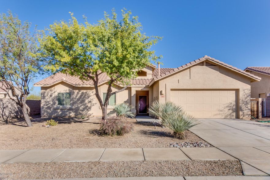 Gorgeous 4BR/2BA+Den (2,156 sqft) in Quail Crossing at Dove Mountain boasts an open floor plan with plenty of entertaining space. Open concept chef's kitchen with SS appliances and plenty of storage.  Great room opens to kitchen for modern living. Spacious master with luxury bath. Custom paint, plantation shutters and plenty of  storage round out this well kept home. Outdoor living at its finest! Lovely French doors open to an extended, covered rear patio and large yard with brick paver patio, faux lawn, and raised back wall for privacy. Plenty of room for a pool! Scenic Dove Mountain is home to the Gallery Golf Club, Ritz-Carlton Resort, a community park and hiking/biking trails. A must see!