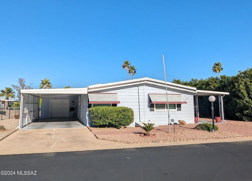 Updated over the years, 2 bedrooms, 2 bath home located in desirable Pueblo Estates. Light and bright open floor plan. Kitchen with lots of cabinets, pantry and a separate dining area. All appliances, A/C and gas heat. Arizona Room (not heated and cooled). Large workshop/storage room. Perfect for a full time resident or winter get-a-way, HOA only $65.00 mo. includes great recreational facilities, heated pool and hot tub, library, billiards, ceramic, exercise rooms. Shuffleboard, horseshoes, bingo, card games etc.  No GVR, but available.