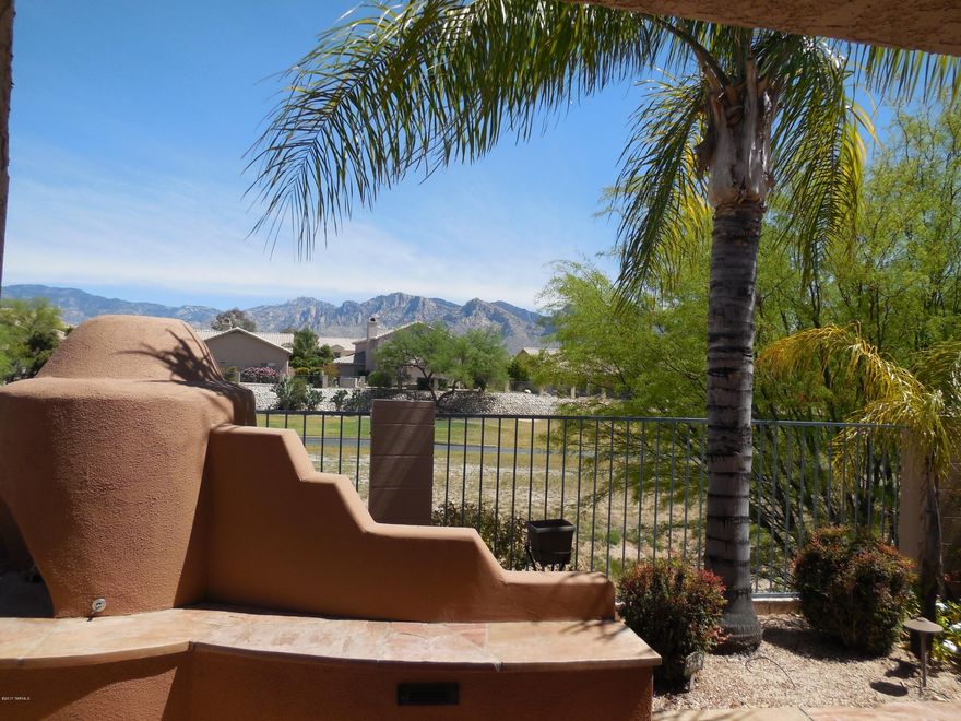 Welcome Home!! This Beautiful East Facing Home 4BDR/3BA/3Car in Canada Hills w/ Fab Catalina Mountain Views on Elevated Premium lot overlooking Golf Course 9th Tee box. Tons of upgrades. Delightful kitchen, Large Upgraded Granite Table & Counters, Pullouts, SS/black appliances, 8' Butler Pantry + cabinets, opens to Fam room w/ gas FP. Master Suite in downstairs w/ dbl. French doors open to back yard w/ more views. Master Bath has freestanding tub & separate large, glass-wall walk-in shower, Dual Vanities, Large Walk-in closet. Formal Dining Room. Living Room has large window to capture Catalina Views. 3 addt'l good sized bedrooms upstairs, all w/Mtn Views. Walnut Wood flooring, Loft w/ built-in bookcases. NO Carpet, only Tile & Wood. Backyard has Solar heated, self-cleaning PebbleTec sparkling pool w/ spa, built-in BBQ w/ Buffet seating area under Covered Flagstone Patio. Kiwa gas FP w/ Seating, AC & heat. New Water Heater 2011, NO Poly. 3-car Garage with epox floor for large toys and working area. Ceiling Fans, Walnut Staircase, Plantation Shutters throughout the house. Gently used as a second home. Citrus tree, 2 solar attic fans, 3 solar tubes. HOA $130.00 a Year! MUST SEE!