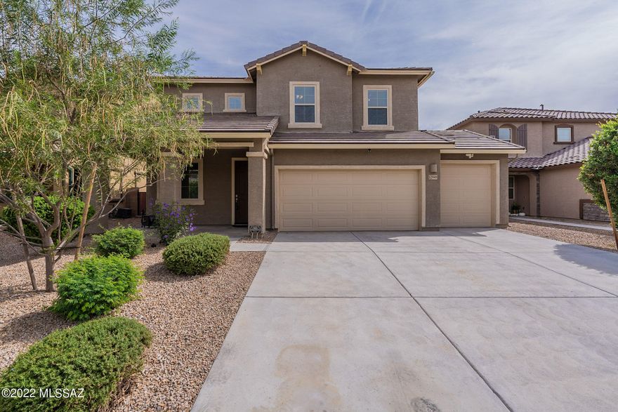 LAST CHANCE! The contingency fell through giving you ONE MORE Chance to scoop up this gorgeous home! Close to I-10 Freeway, shopping Mall and new Fry's going in soon within walking distance! $36K Solar Panels PAID OFF at COE! Average electric bill is $87! This Lennar Home is LOADED with Upgrades! Situated in the coveted HOMESTEAD in Gladden Farms, this Gorgeous Columbus model boasts a gourmet kitchen, wood look plank tile, 4 car garage, beautiful mountain view, landscaped back yard, Gutters, Solar and more! Enter into your spacious flexible family space that has endless opportunities! The beautiful wrought iron banister staircase leads you upstairs where you'll find your spacious Loft and spilt floor plan.  This home also features smart home technology throughout that will convey!