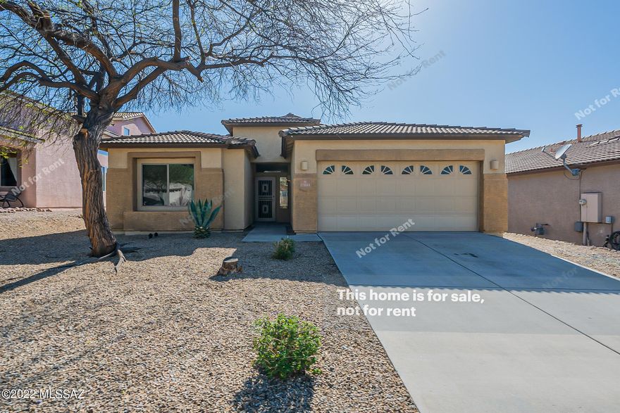 Welcome to this gorgeous neighborhood! Terrific 3 bedroom and 2 bath home with a 2 car garage. Enjoy cooking in this stylish kitchen with stainless appliances and a center island, great for food preparation. Step inside this beautiful interior with tile floors, plenty of natural light, and neutral palette. Primary bathroom features a separate tub and shower and a walk-in closet. Entertain on the covered back patio, perfect for barbecues. Don't wait! Make this beautiful home yours today.
