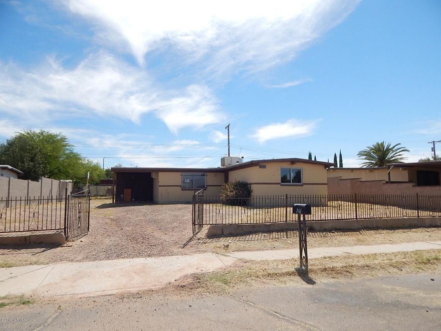 This is a Fannie Mae HomePath property. With 992 sq ft of living space this home has 3 bedrooms, 2 bathrooms & large backyard. Located close to I-19, shopping, restaurants, & much more! Attention First Time Buyers: complete the HomePath Ready Buyer homeownership course. Attach certificate to offer and request up to 3% closing cost assistance. Ask Listing Agent for more details. Restrictions apply.