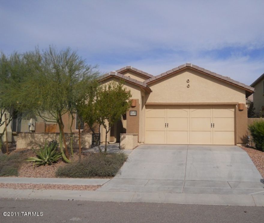This beautiful home has carpet and tile throughout,a gas fireplace in the family room and  the home also features a large kitchen with breakfast nook. The large master bedroom has a  dual sink in master bathroom, plus more! The community park is located close by great for family days with the kids or pets.  The Refrigerator, washer and dryer are included with this home. This home can be rented for 12 months or longer.