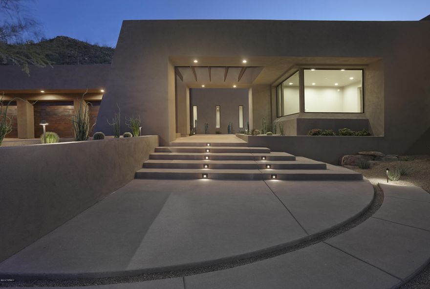Gorgeous brand new home in the stunning neighborhood of Canyon Pass.  Perched among the Tortolita Mountains on a light filled 2 acre lot, this desert gem features immaculate landscape with mature trees and cacti, private courtyard entry, Huge pool & spa and arguably one of the best outdoor patio spaces in Southern Arizona.  Entertain beneath soaring great room ceilings; unleash your inner Julia Child in the gourmet indoor and outdoor kitchens featuring appliances by Sub-Zero & Wolf.  Indulge yourself in the master suite with its own exercise room, spa-like bath and custom closet.  Your guests will love the large guest suites with walk-in closets, amazing views and fabulous bathrooms.  The large den is the perfect workplace as long as you don't let the endless mountain views distract you.