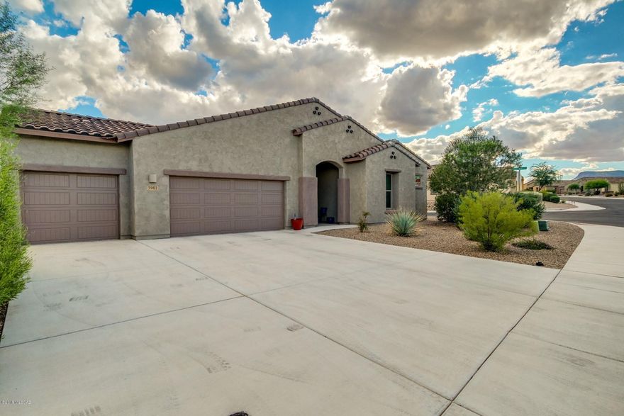 MUST SEE!! Don't miss this opportunity to impress your Buyer's by SHOWING this Silverbell BEAUTY. Pride of Ownership on this meticulously maintained home shines through. Homes in this Private Gated Community do not come on the market often.  This is a Split Great Room floor plan w/10 ft ceilings throughout featuring 4 bedrooms 3 baths plus a den, formal dining and a 3 car Garage on a LARGE 11,326 Corner Lot with a North South Exposure. The Kitchen is a Chef's dream with a SS KithenAid Appliance package featuring a Double in wall oven, separate Cook-top w/gas option and Granite Countertops. Tastefully appointed Upgrades Throughout include tile in Great Room, Formal Dining Area, Bathrooms and in all traffic areas. The Master Bathroom has Granite Countertops, separate large soaking tub, tiled shower, double sinks with a large master closet w/Cal Closet Built-ins.The home is equipped with fire sprinklers, whole house water softener, prewired for Audio, Ceiling fans installed throughout and is "Energy Efficient" The backyard is an Entertainers Delight with Beautiful Mountain Views, professionally landscaped, large covered patio, Gorgeous solar and gas heated Salt Water Pebble Tec Pool w/in floor cleaning system, slide, waterfall and Grotto. Drip irrigation system to plants, Synthetic grass, all very low maintenance.  Ideal location close to shopping, dining, entertainment. Walking distance to Award-Winning Leman Academy School, Library and Crossroads District Park. New Ina Intersection allows for easy on/off freeway access. Entry to "The Loop" 110 mile paved bike trail system is less than 1 mile away! Refrigerator, Washer, Dryer and Some Furnishings may convey on a separate bill of sale. THIS HOME IS A MUST SEE!!!