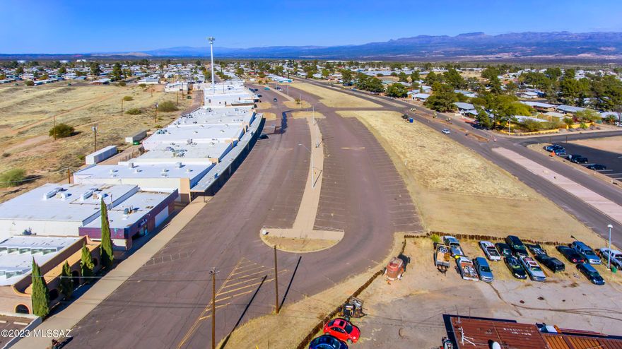 Approximately 68000 ft shopping center. 21 units, 15 units are rented, There is so much potential. One unit was a bank and still has the safe. Units range from 400 sqft to 14,860 sqft.  There are 317 parking spaces that are 20x10. All roads and parking spaces are asphalted. There are about 8,000 to 10,000 people in San Manuel and the adjoining towns and areas that shop here in San Manuel.