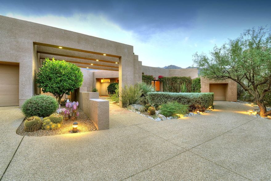 UNINTERRUPTED CATALINA MOUNTAIN VIEWS. 1 Story Custom Contemporary. Set back from street creates 100% privacy. Every detail thought out in kitchen, storage, cabinetry, built-ins, closets & lay out. Spacious kitchen w/ upgraded stainless appliances inc. 2 Bosch dishwashers, Sub-Zero, expansive solid wood cabinets, reverse osmosis & prep spaces. Open living & dining w/ 12' ceilings, unique onyx hearth & wall above gas fireplace. Expansive master suite w/ dream walk-in closet +3 more closets. Split plan w/ 4 extra bedrooms for multiple uses to set up how it works for you. Outside comes in with several sitting & entertaining areas. Mature lush landscaping. Easy year round or winter home. .8 acre. Low E Pella Windows. 3 HVAC zones. Addition(1998)steel construction.